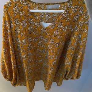Yellow flower patterned blouse